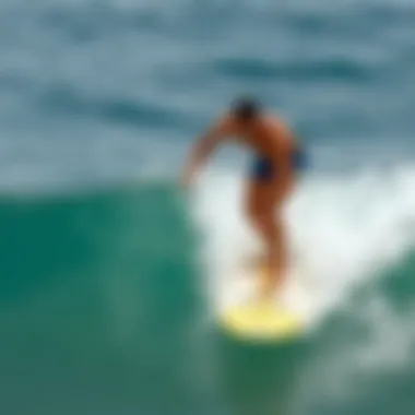 Demonstration of proper body positioning on a surfboard