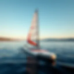 A sleek paddle board with a sail attachment catching the wind on a calm lake