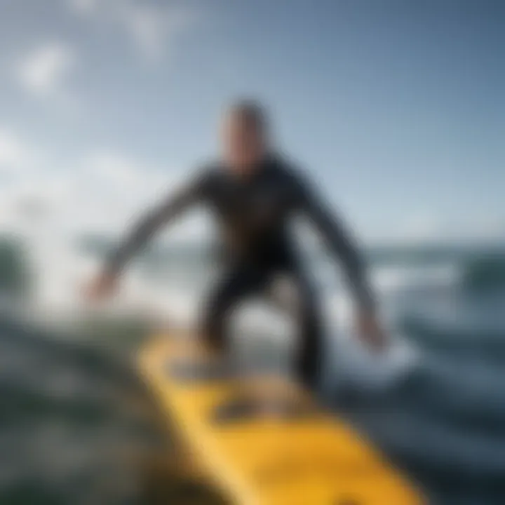 An athlete performing surfboarding while wearing the Ocean Rodeo Soul Drysuit in action