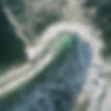 Aerial view of ocean waves crashing on the shore