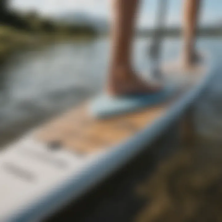 Close-up of a paddle board showcasing dimensions suitable for taller users