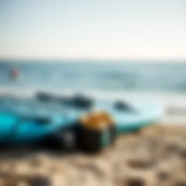 Paddleboarding gear spread on the shore