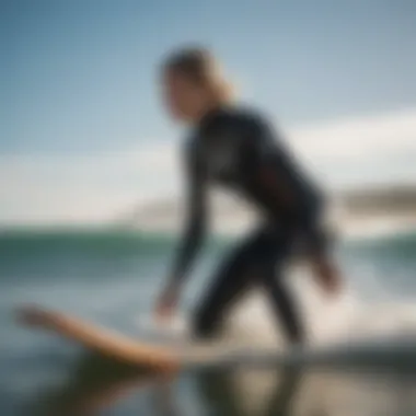 Female surfer in action wearing Roxy wetsuit