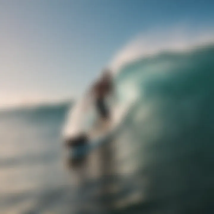 Surfer riding waves with leash