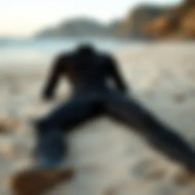 A Well-Fitted Wetsuit on the Beach A well-fitted wetsuit laid out on a sandy beach