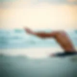 Effective Stretching Techniques for Surfers Surfer practicing stretching exercises on the beach