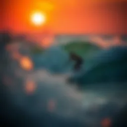 Surfing waves at Pensacola beach with a beautiful sunset in the background