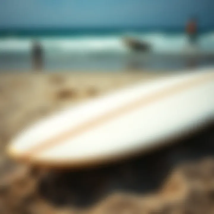 Craftsmanship in Surfboards: Art Meets Function A close-up of a surfboard on the sandy beach, showcasing its design and craftsmanship.