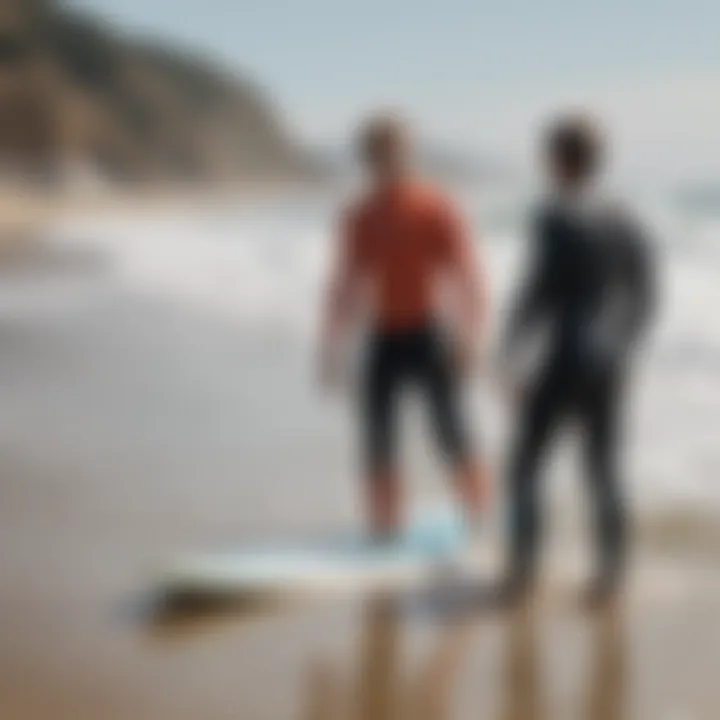 Instructors guiding students in surf techniques on the sand