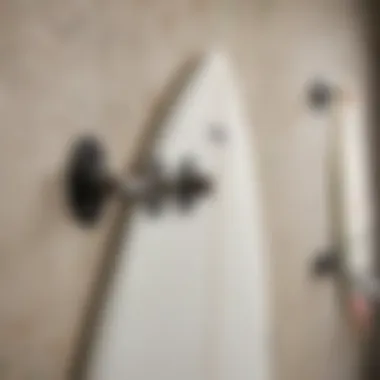 Detailed view of wall mounting hardware for surfboards