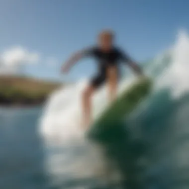 An experienced surfer riding a wave in Kihei