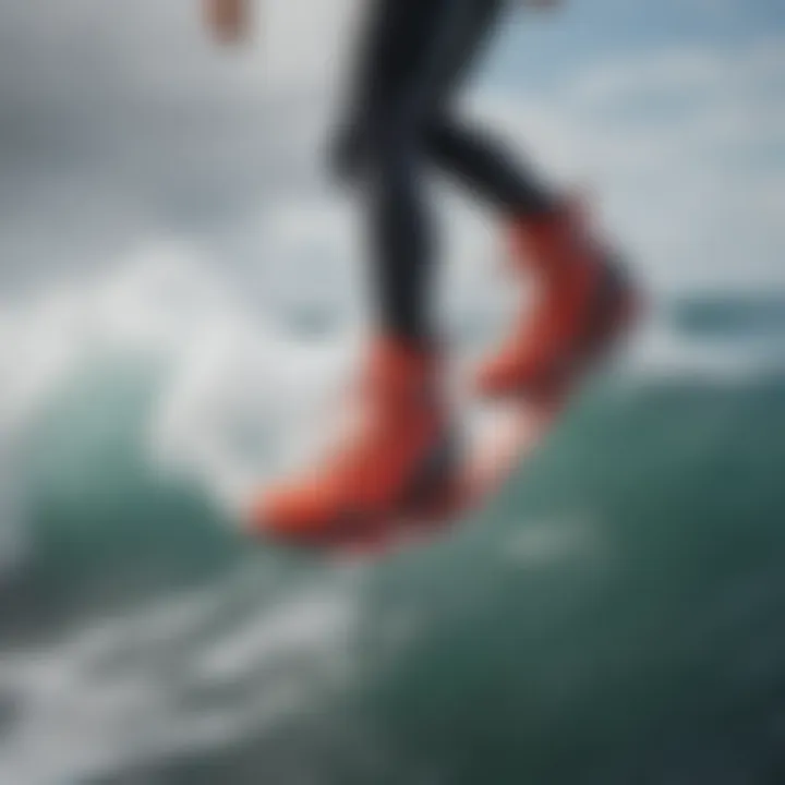 Surfer wearing Rip Curl surf booties in action on waves