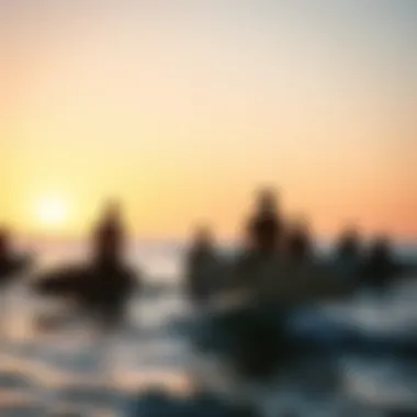 Group of Surfers Enjoying the Sunset Group of surfers enjoying the sunset