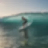 A surfing instructor guiding a novice in ocean waves