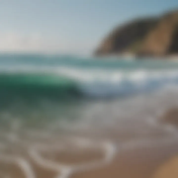 A tranquil beach scene with surfers catching waves in the distance