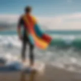 Surfer in a vibrant wetsuit towel poncho after a wave