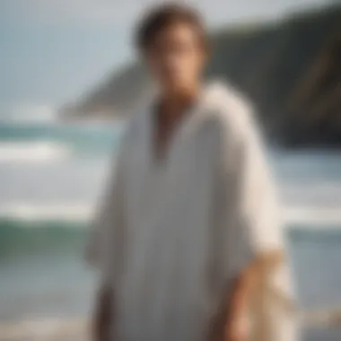 Surfer in a Stylish Towel Poncho A surfer wearing a stylish towel poncho after a ride
