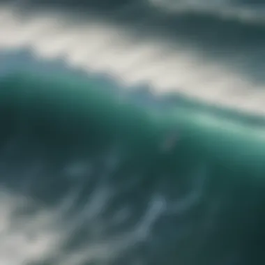 An aerial view of surfers tackling massive swells