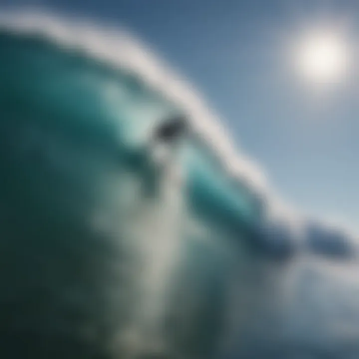 Surfers riding waves under a clear blue sky