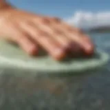 Close-up view of a textured grip pad on a surfboard