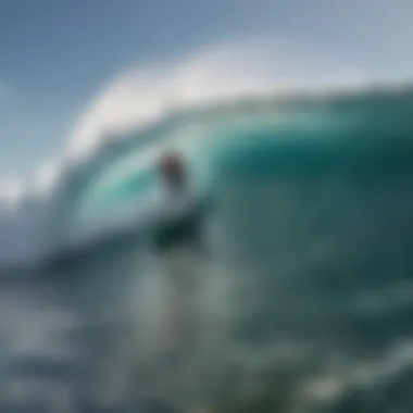 Surfer riding a wave on a wide surfboard