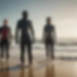 Diverse wetsuit styles displayed on a sandy beach