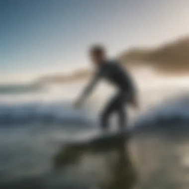 Surfer in Action with the Right Wetsuit Surfer enjoying waves while wearing the appropriate wetsuit
