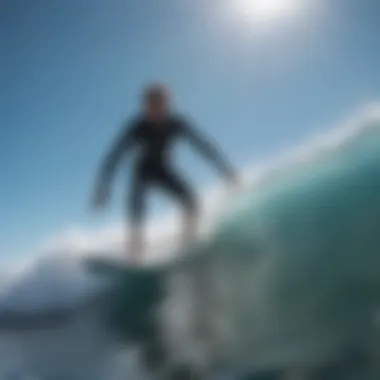 Surfer Riding Wave A surfer rides a wave under a clear blue sky with wind direction indicators.