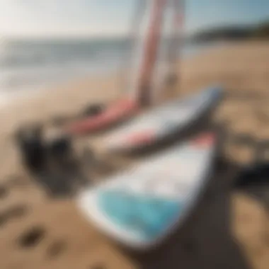 Necessary equipment for novice windsurfers Essential windsurfing gear laid out on the beach