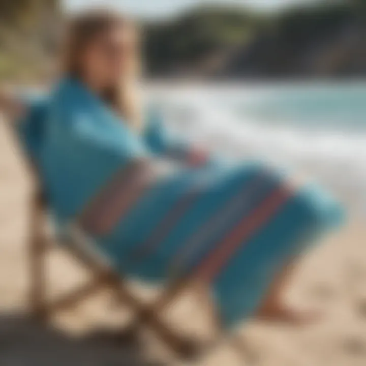 Vibrant surf poncho towel draped on a beach chair